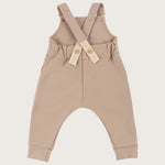 Baby tuinbroek/ salopette in zandkleur - achterkant