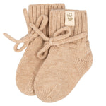Beige_merino_wollen_slofjes.jpg__PID:1420858e-c9ad-475e-a362-234f2737d59e