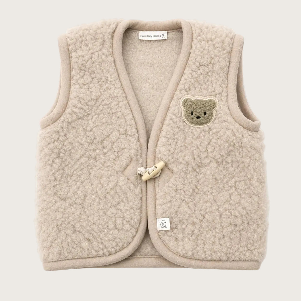 wollen bodywarmer voor baby en peuter met beer applicatie