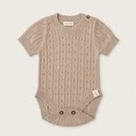 Beige pointelle gebreide romper van katoen 