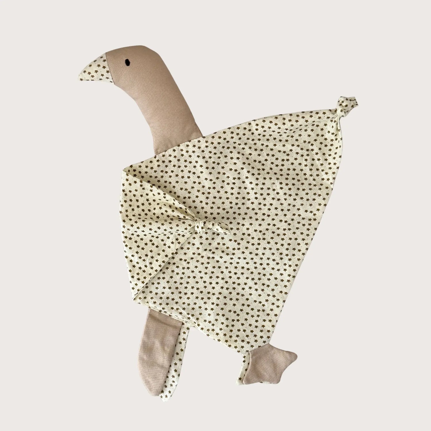 beige knuffelgans met sterren print