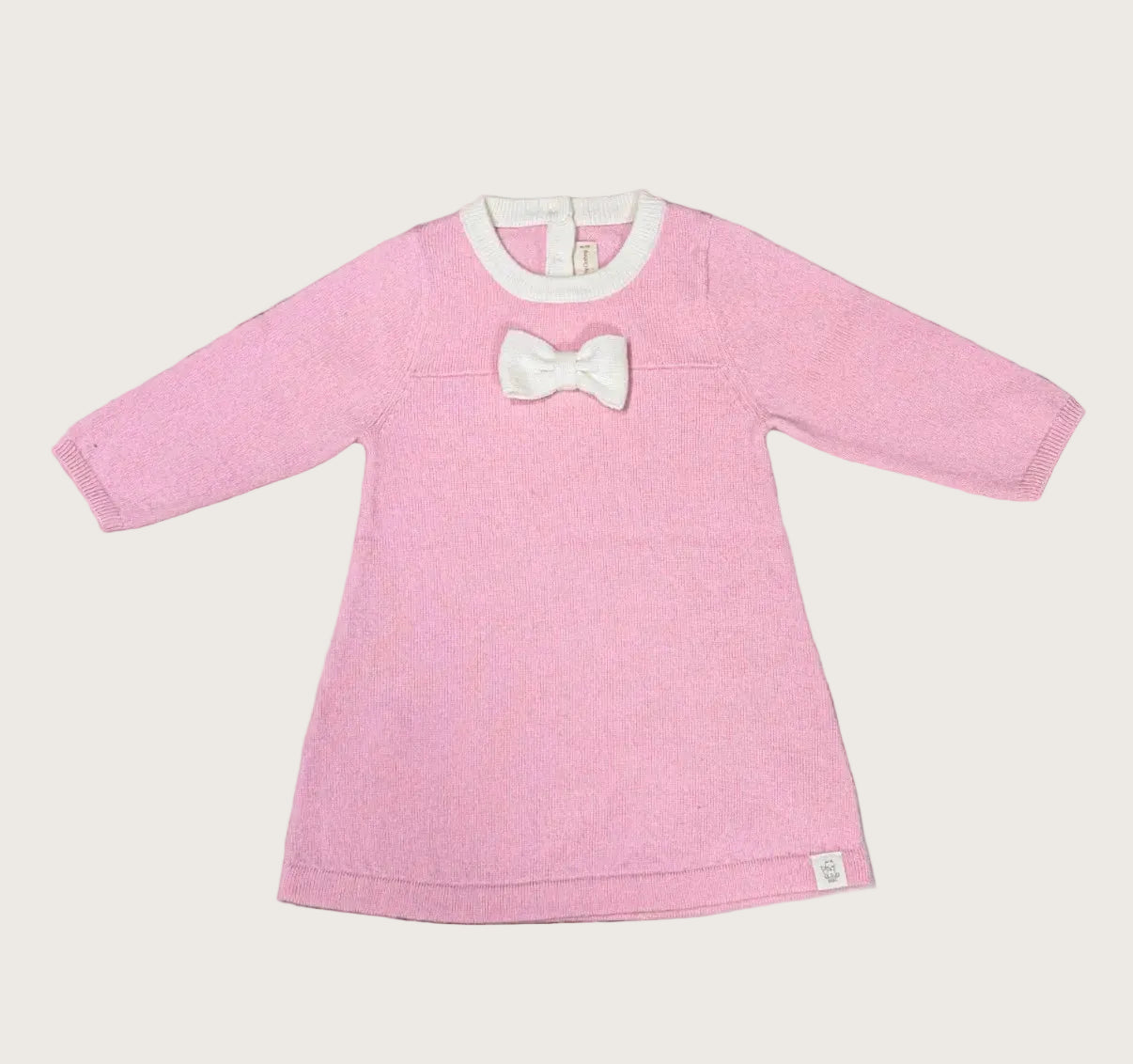 Merinowollen baby jurkje roze met strikje