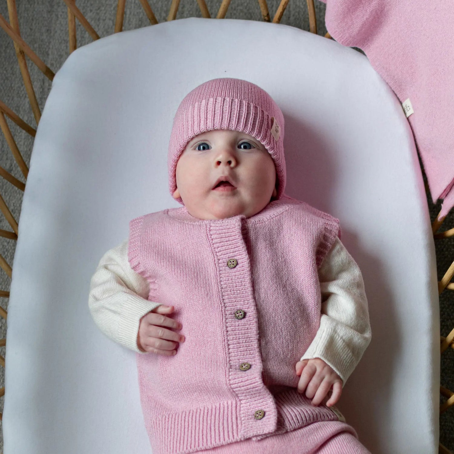 Merinowollen baby mutsje roze 
