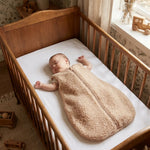 slapende baby in merinowollen slaapzak van Moalie