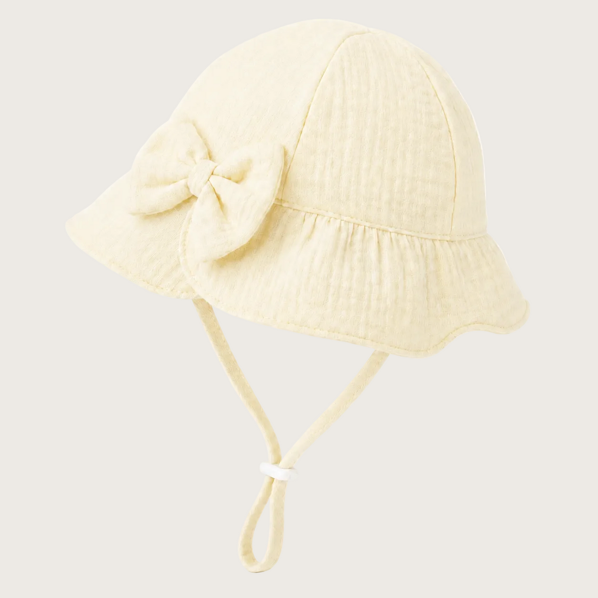 Mousseline baby zomerhoedje buttercup yellow 