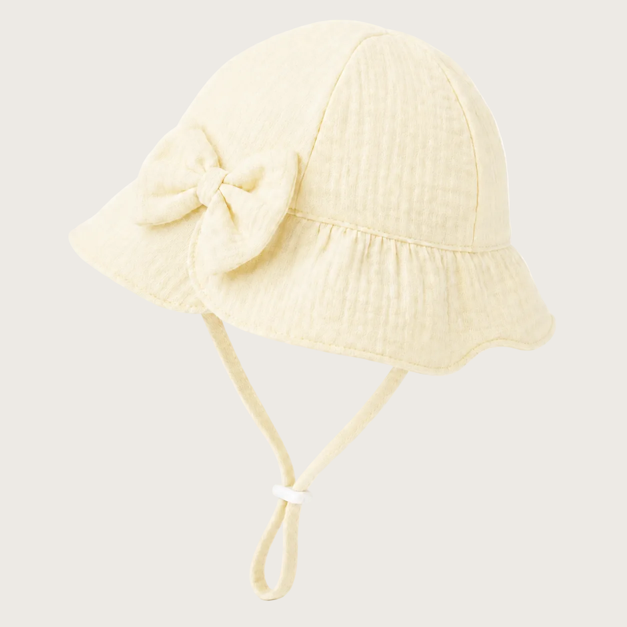 Mousseline baby zomerhoedje buttercup yellow 