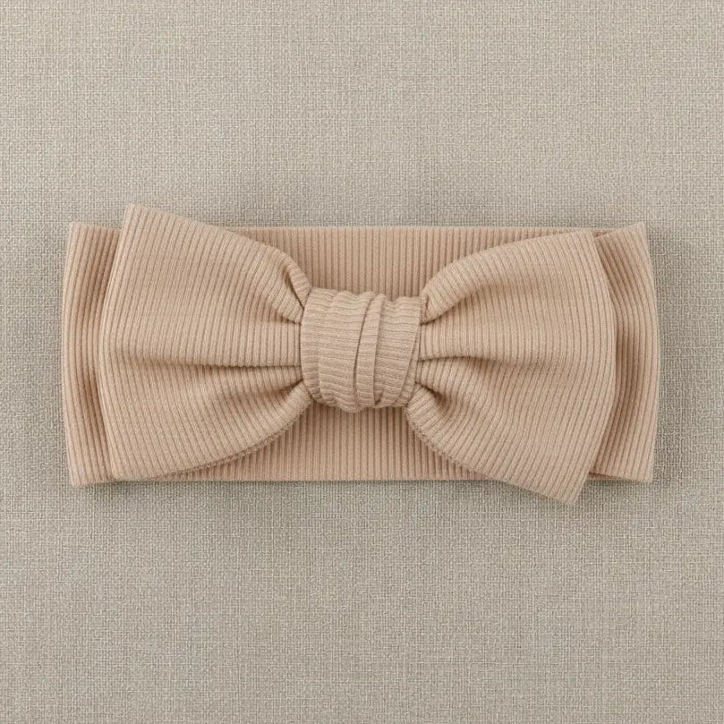 beige haarband met grote strik voor baby's 