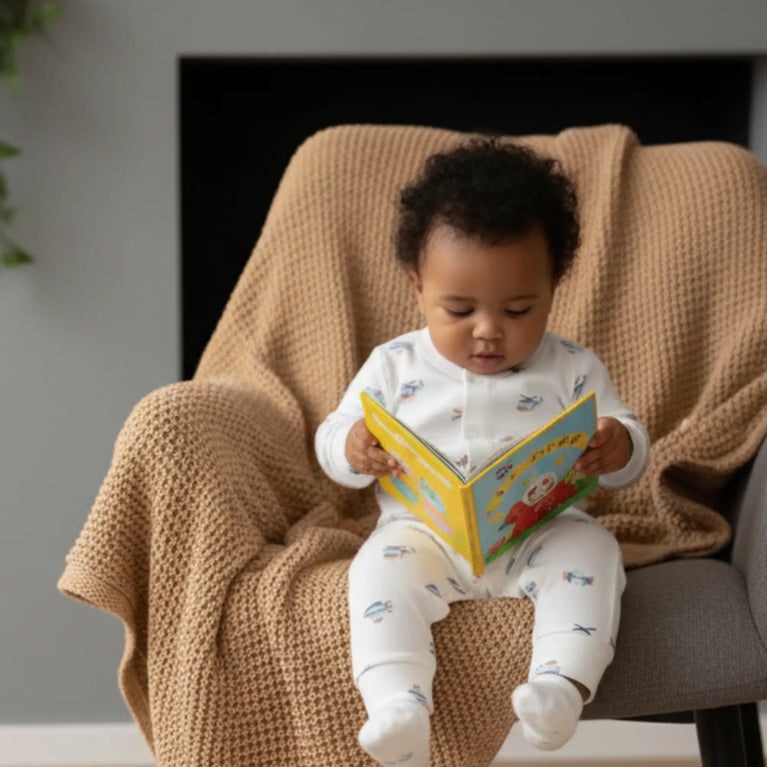baby in boxpakje met vliegtuig print 