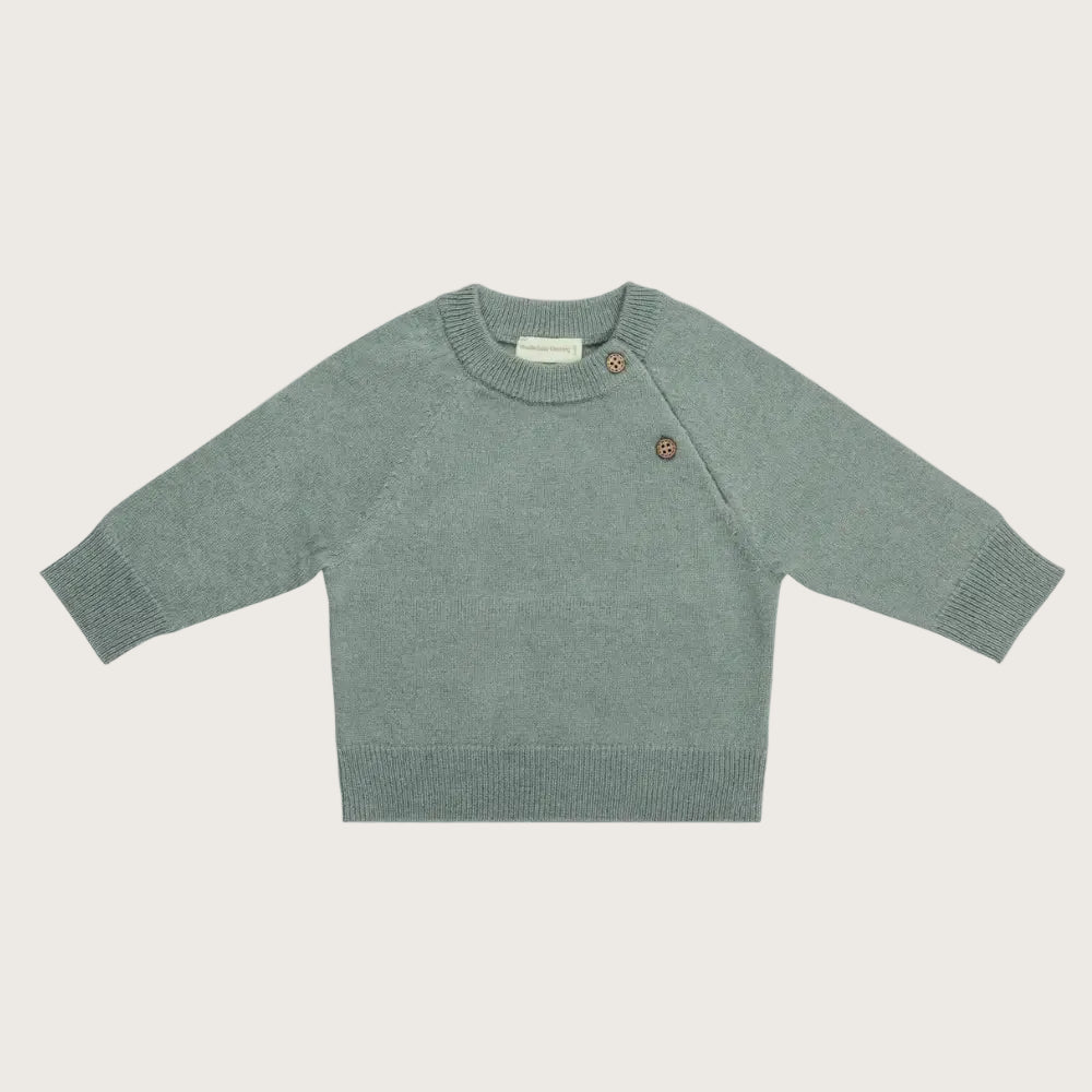 Gebreide wollen babytrui in sage groen, gemaakt van merinowol en cashmere 