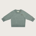 Gebreide wollen babytrui in sage groen, gemaakt van merinowol en cashmere 