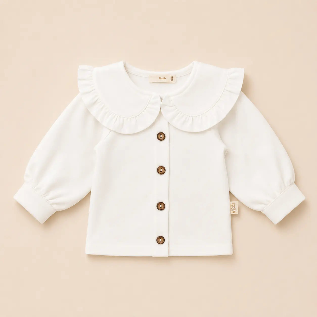 off white katoenen baby bloesje met geruffelde kraag 