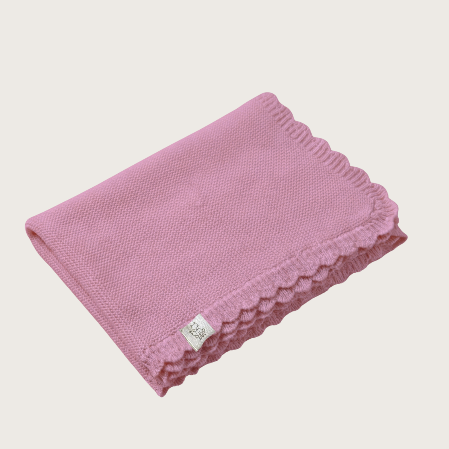 Copertina rosa per culla con bordo arricciato - cotone