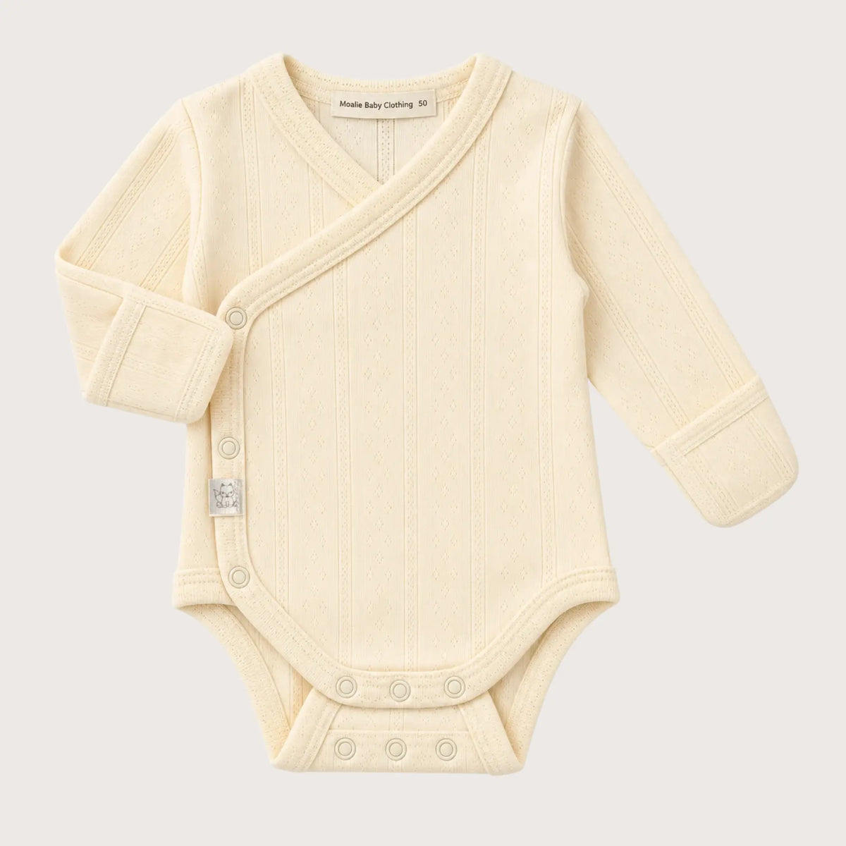 Moalie overslagromper pointelle Butter Cream zachtgeel