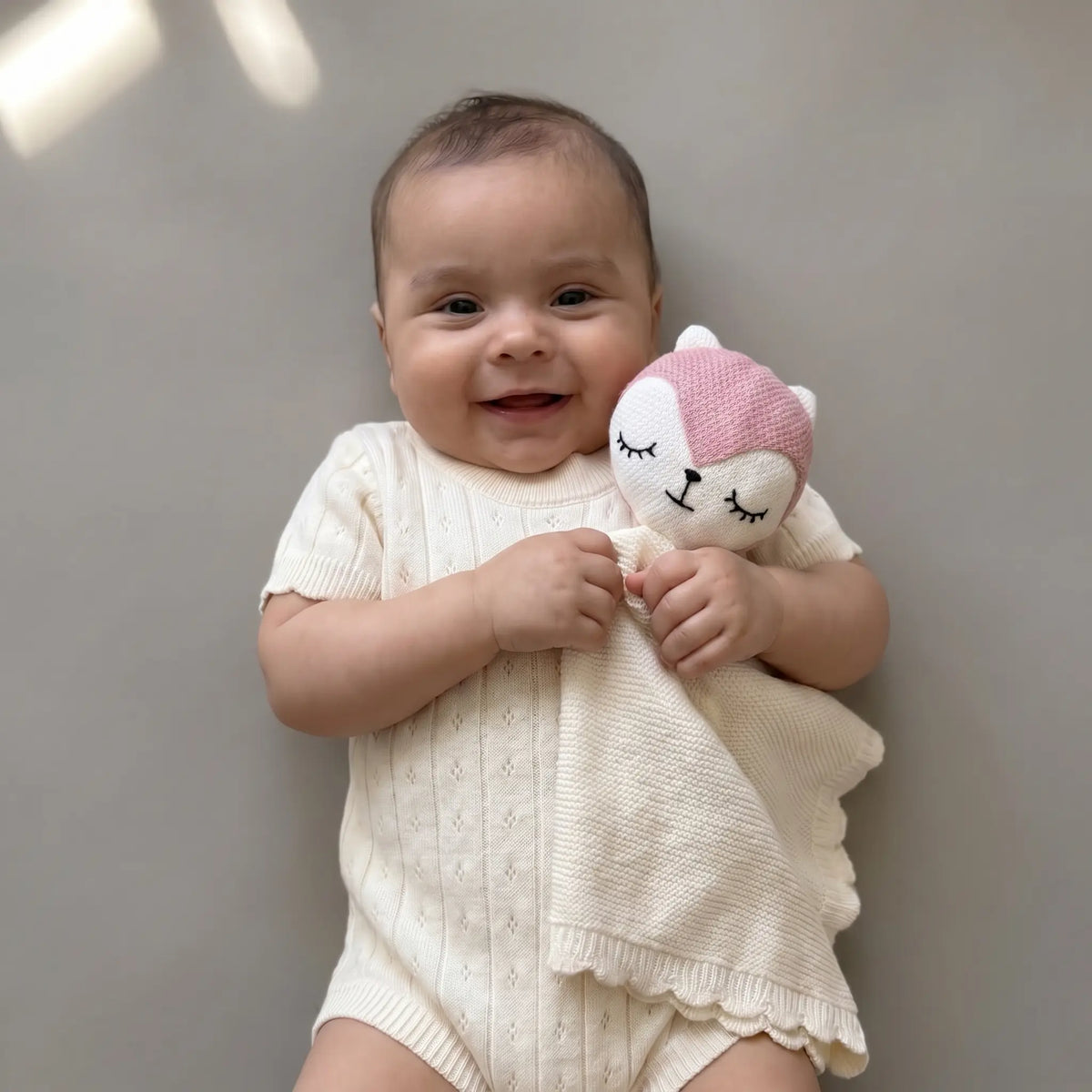 pointelle knit romper cream cotton