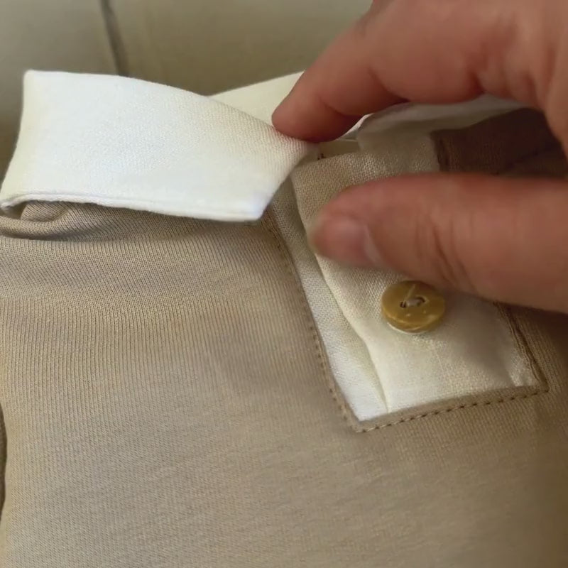 polo met verborgen drukknoopjes achter houten sierknoopjes