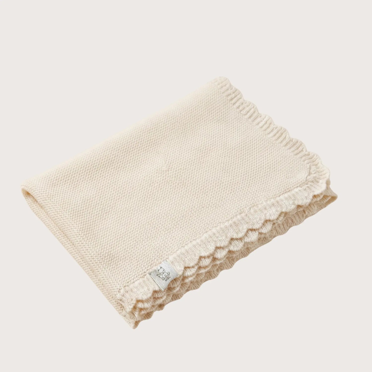 Copertina rosa per culla con bordo arricciato - cotone